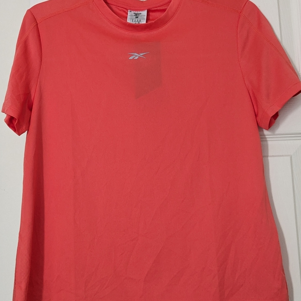 Women's Reebok Speedwick short sleeve shirt. NWT. Size medium.